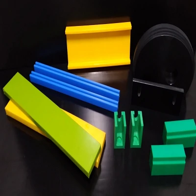 Componentes em UHMW para sistemas transportadores industriais